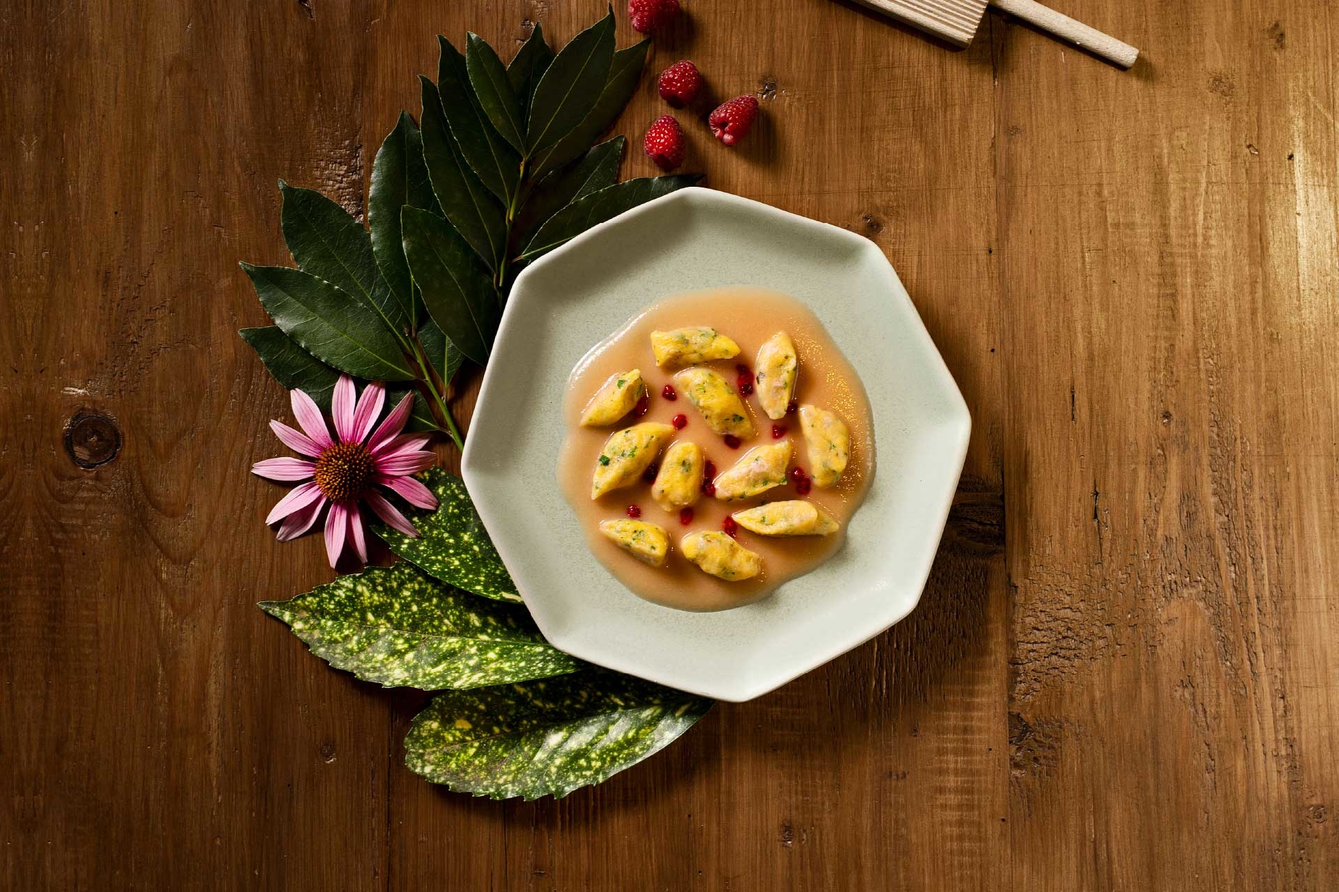 Potato gnocchi and Gruyère with nettle in an onion and raspberry sauce